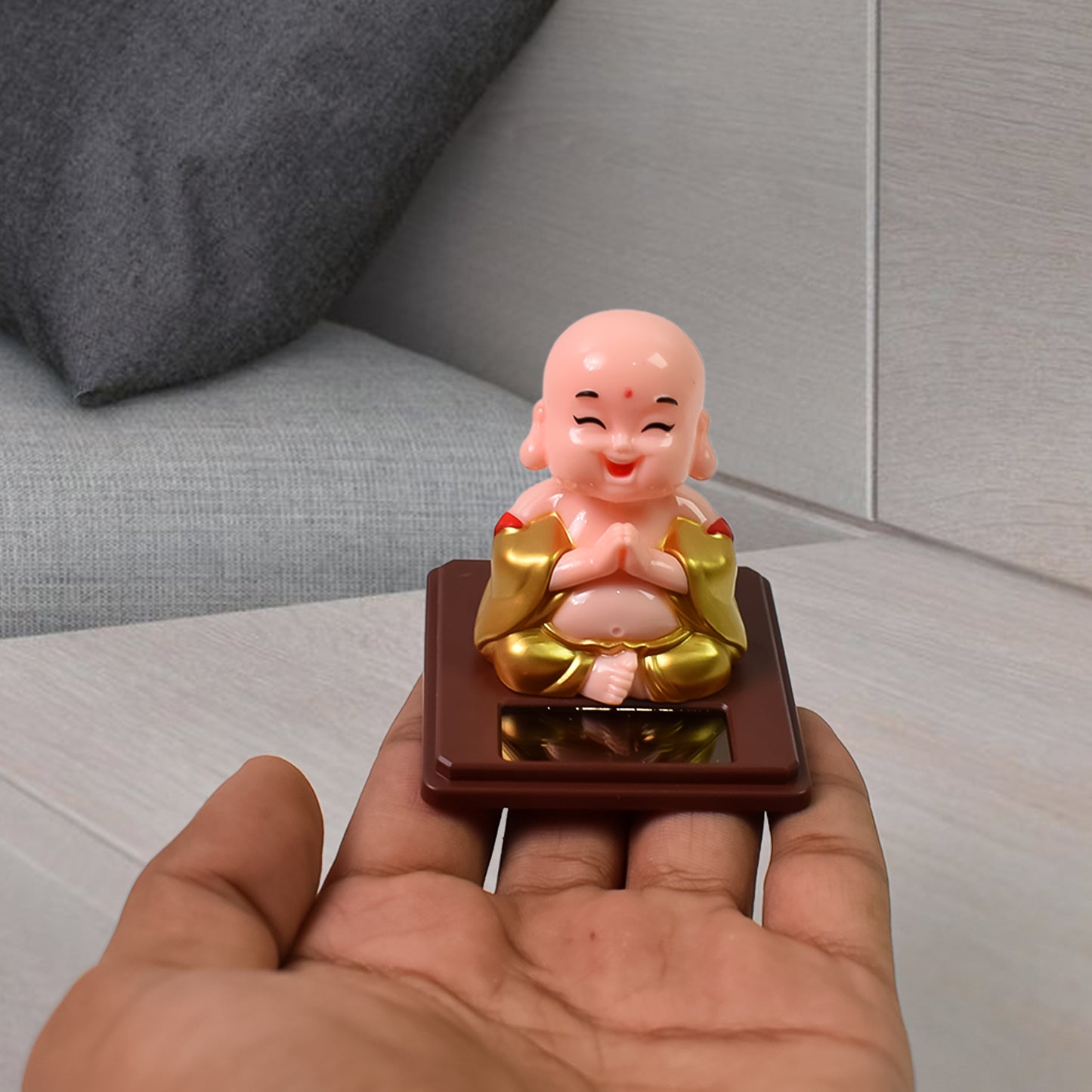 Solar-Powered Moving Head Buddha Statue – Peaceful & Decorative Car Ornament
